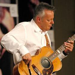 Tommy Emmanuel – Happy Go Lucky Guitar